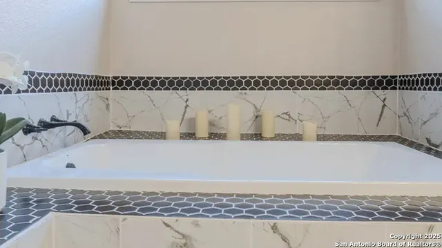 a view of a bathtub in a bathroom