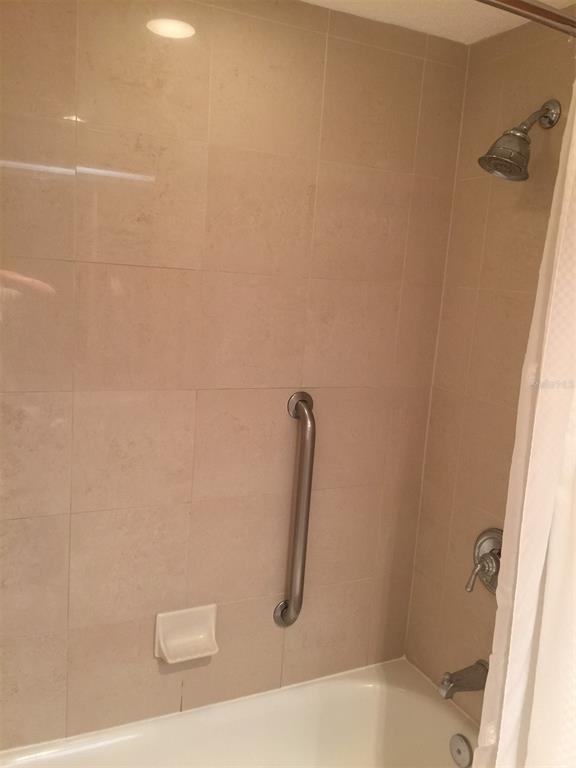 36750 Highway 19, Unit 13214 Palm Harbor, FL 34684 - Photo 10 of 13 a bathroom with a shower