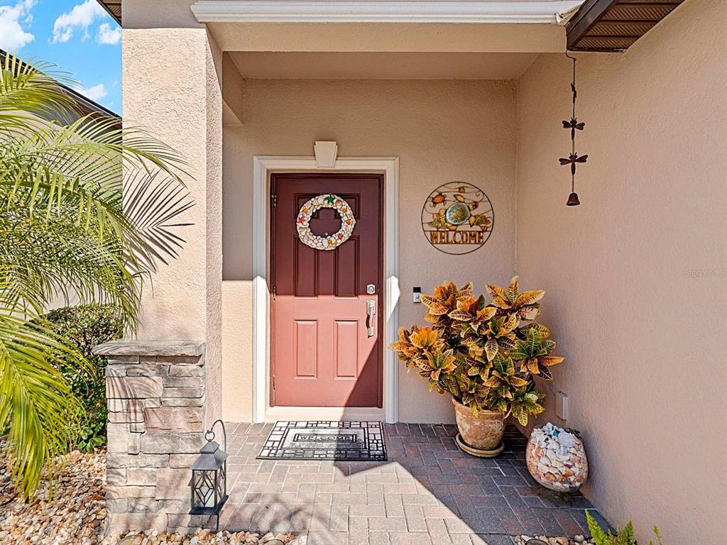 1716 Hadden Hall Place Trinity, FL 34655 - Photo 7 of 75 a view of entryway with wooden floor