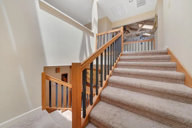 a view of a dinning table and chairs in patio