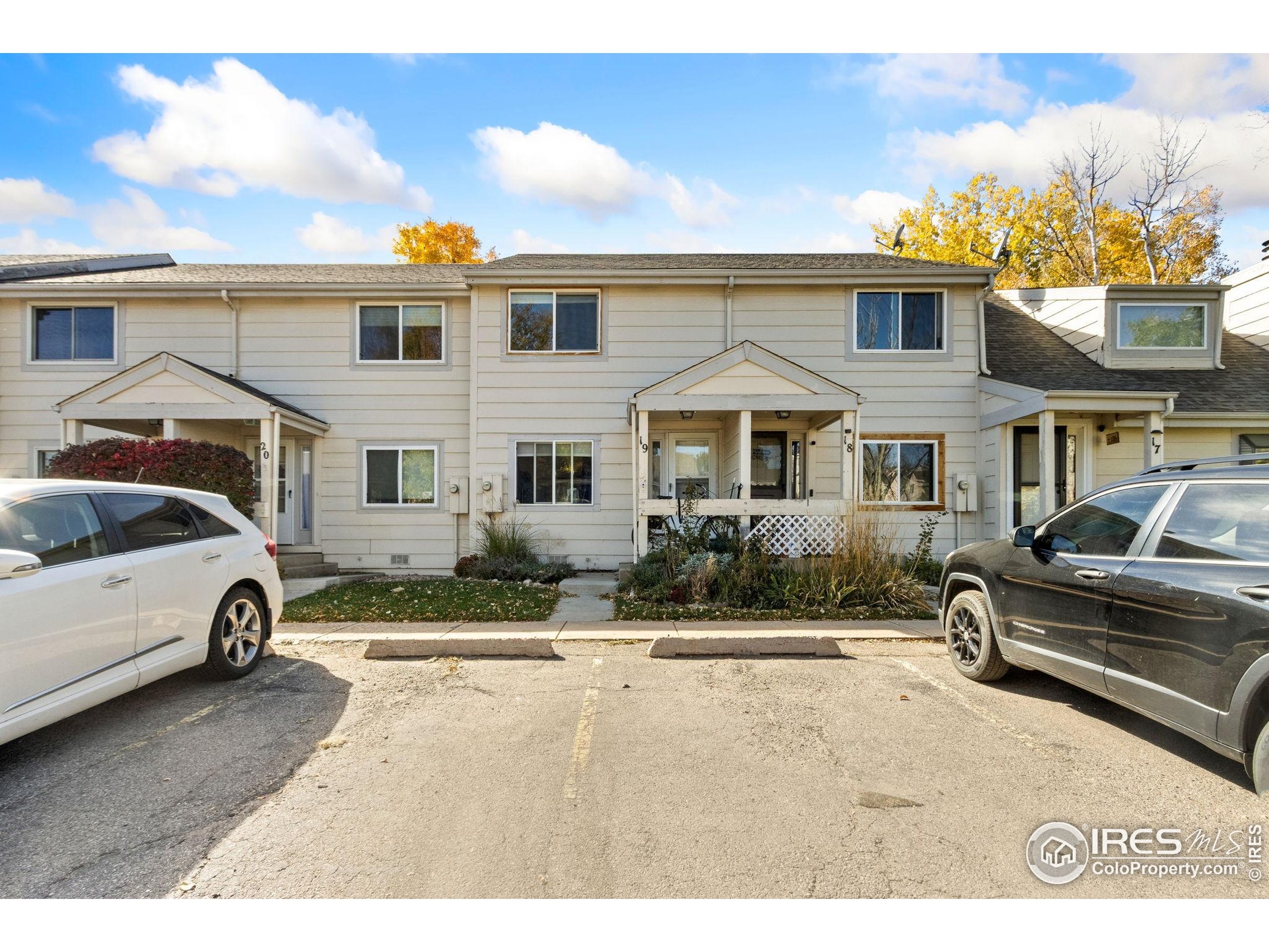 2924 Ross Drive, Unit 19 Fort Collins, CO 80526 - Photo 28 of 28 a house view with a outdoor space