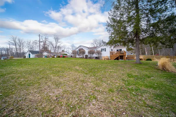a view of a field with of house