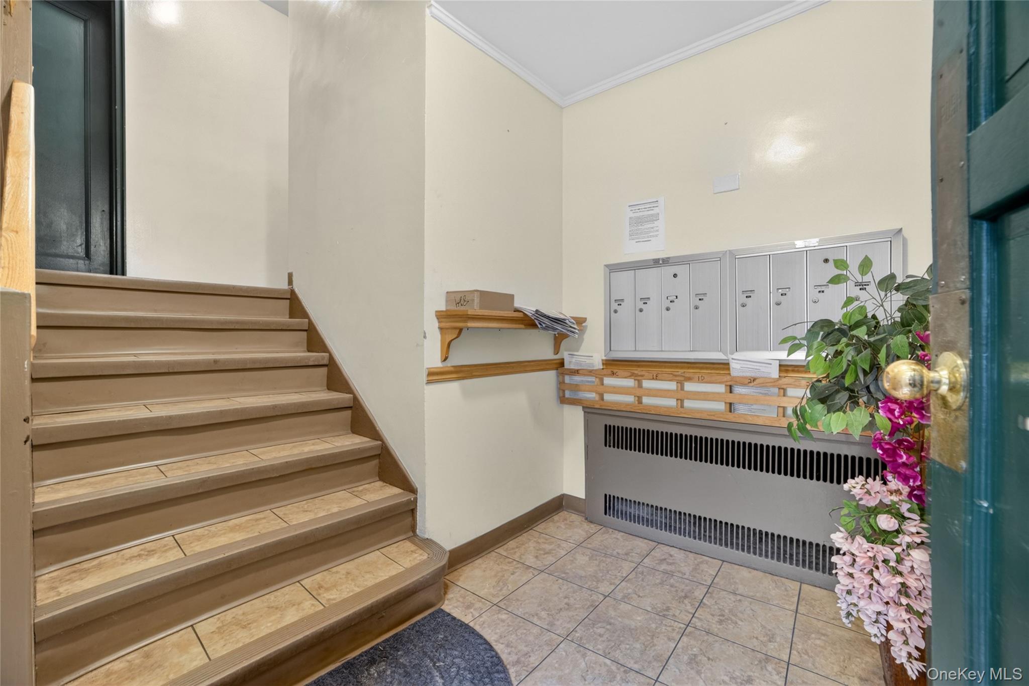 824 Palmer Road, Unit 1F Bronxville, NY 10708 - Photo 20 of 26 a view of entryway with wooden floor and a potted plant