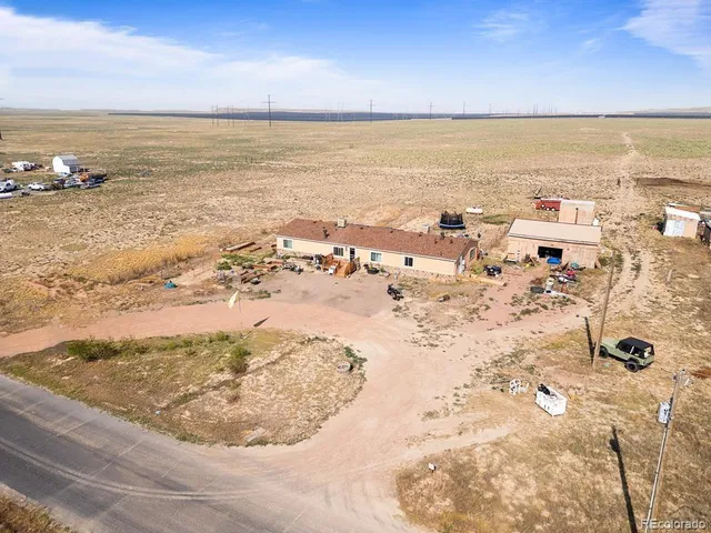 an aerial view of beach and ocean