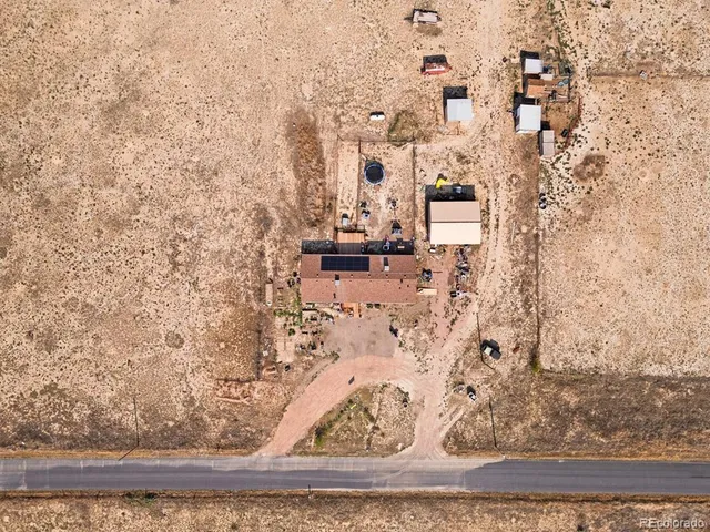 an aerial view of beach and ocean