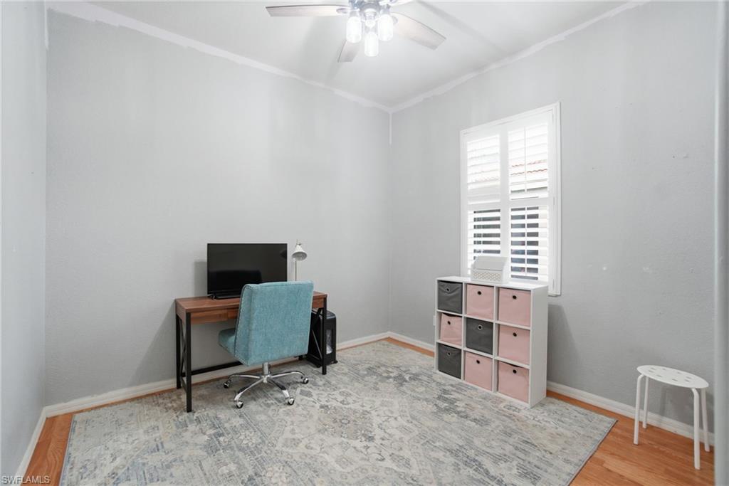 2900 Orange Grove Trail Naples, FL 34120 - Photo 29 of 46 a view of a workspace with furniture and a window