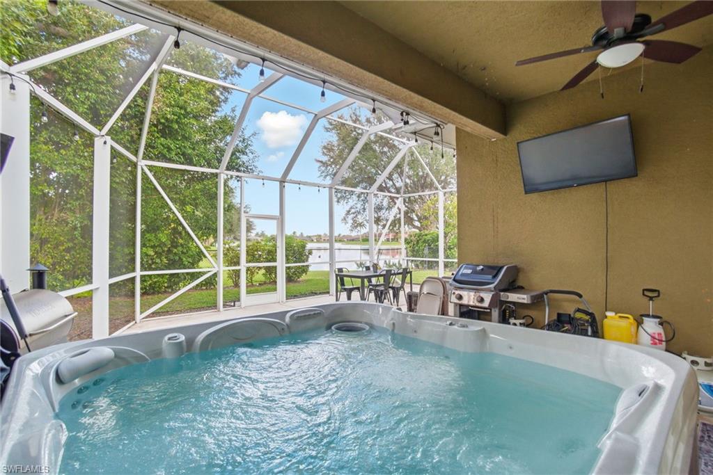 2900 Orange Grove Trail Naples, FL 34120 - Photo 37 of 46 a view of a chairs and table in the patio