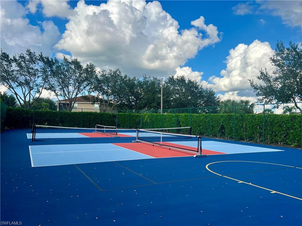 2900 Orange Grove Trail Naples, FL 34120 - Photo 43 of 46 a view of a tennis court