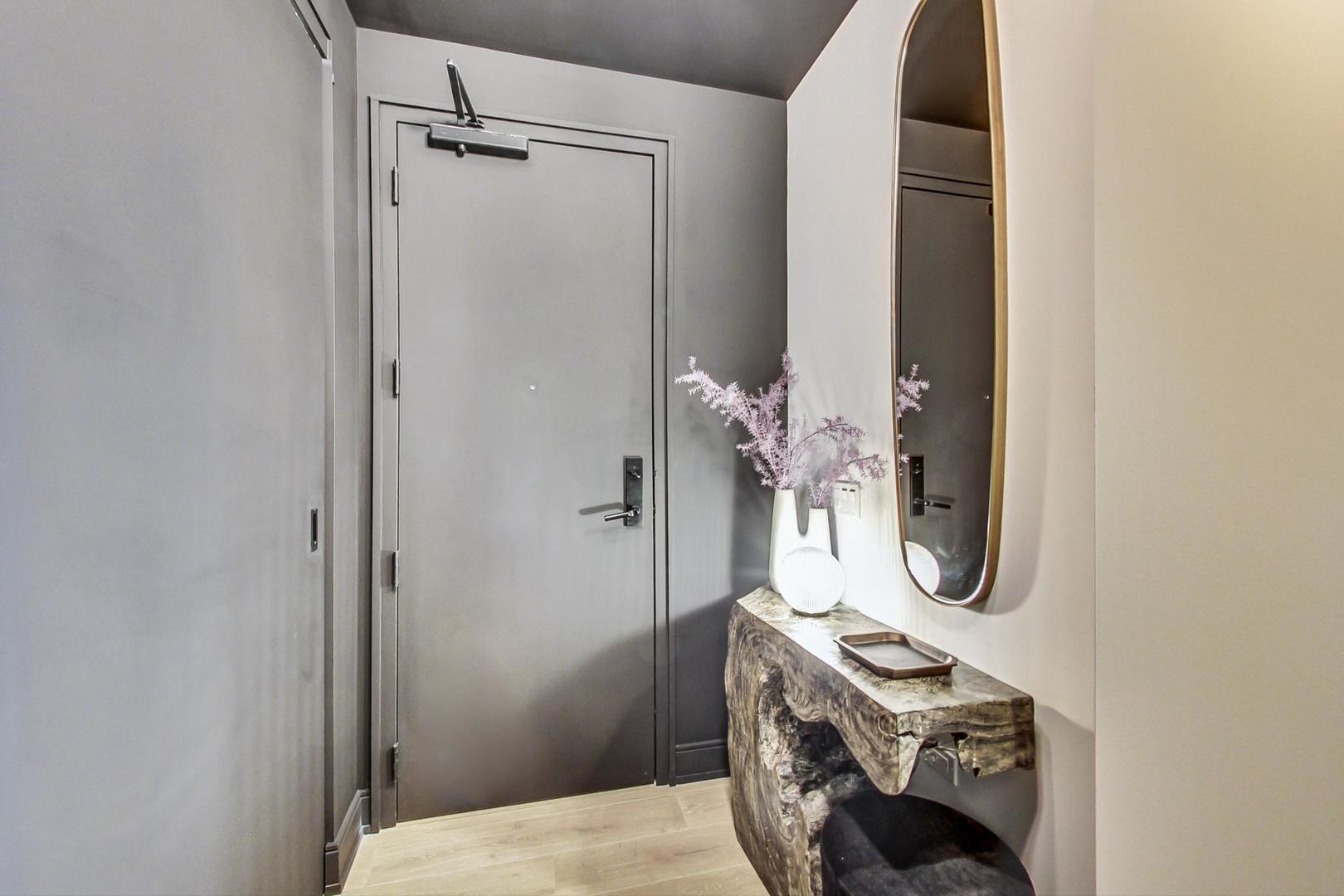 111 South Peoria Street, Unit 309 Chicago, IL 60607 - Photo 7 of 43 a bathroom with a sink a toilet and shower