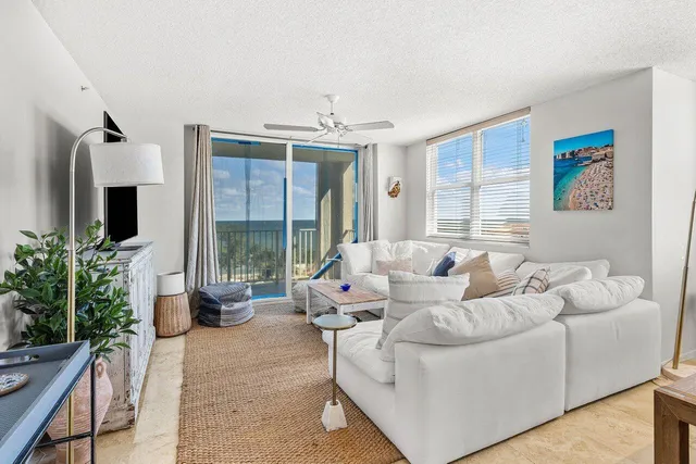 a kitchen with sink cabinets and refrigerator
