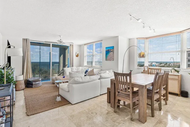 a kitchen with granite countertop a sink and a stove top oven
