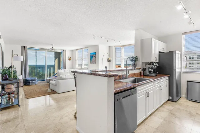 a bedroom with a bed and a table