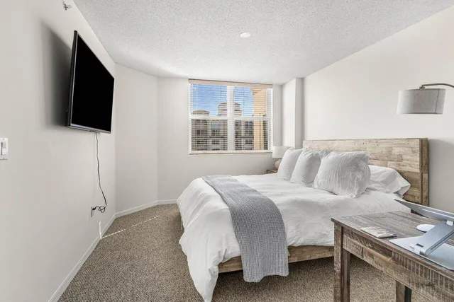 a view of a garden with a house