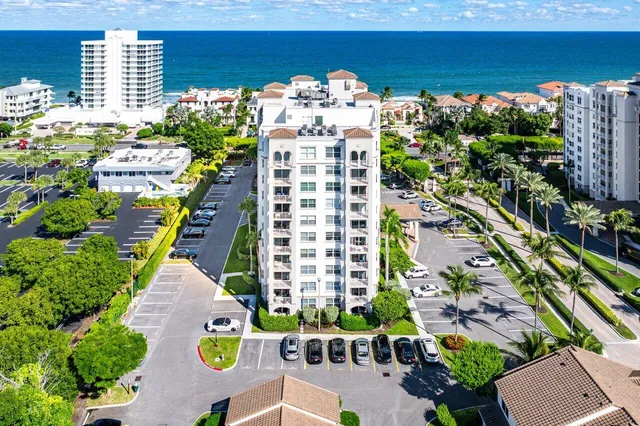 a view of a dining room with furniture and window