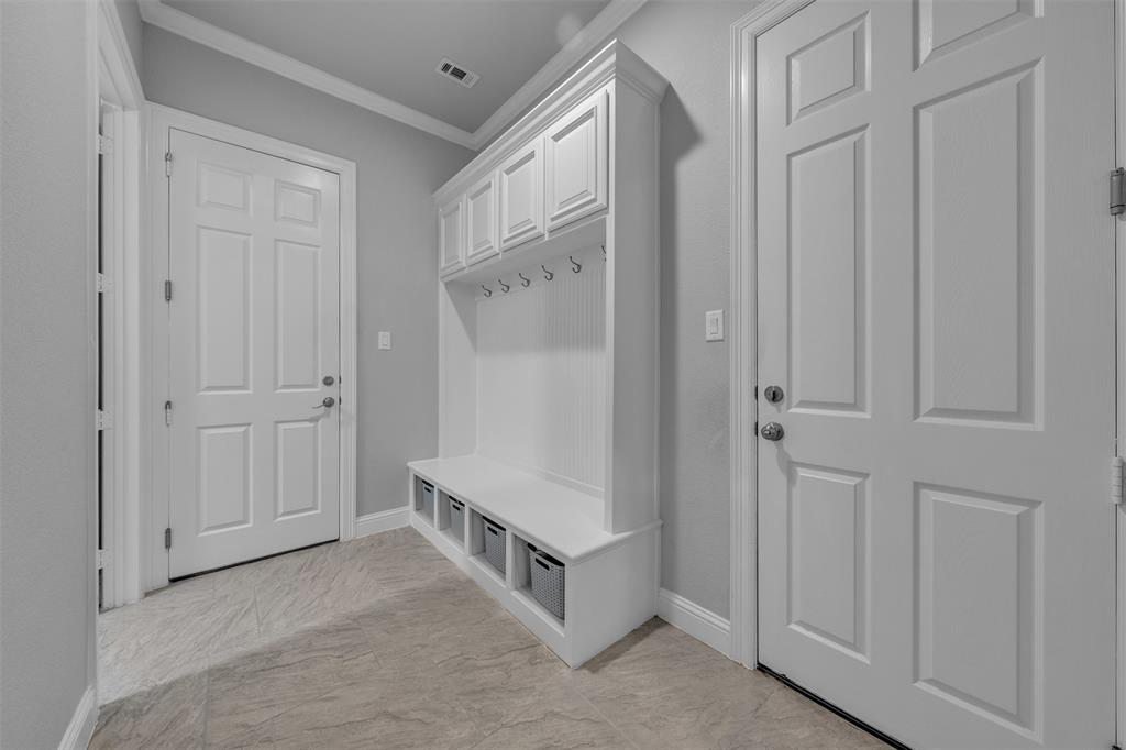 1060 Waters Edge Court Oak Point, TX 75068 - Photo 24 of 40 a view of a hallway with closet area