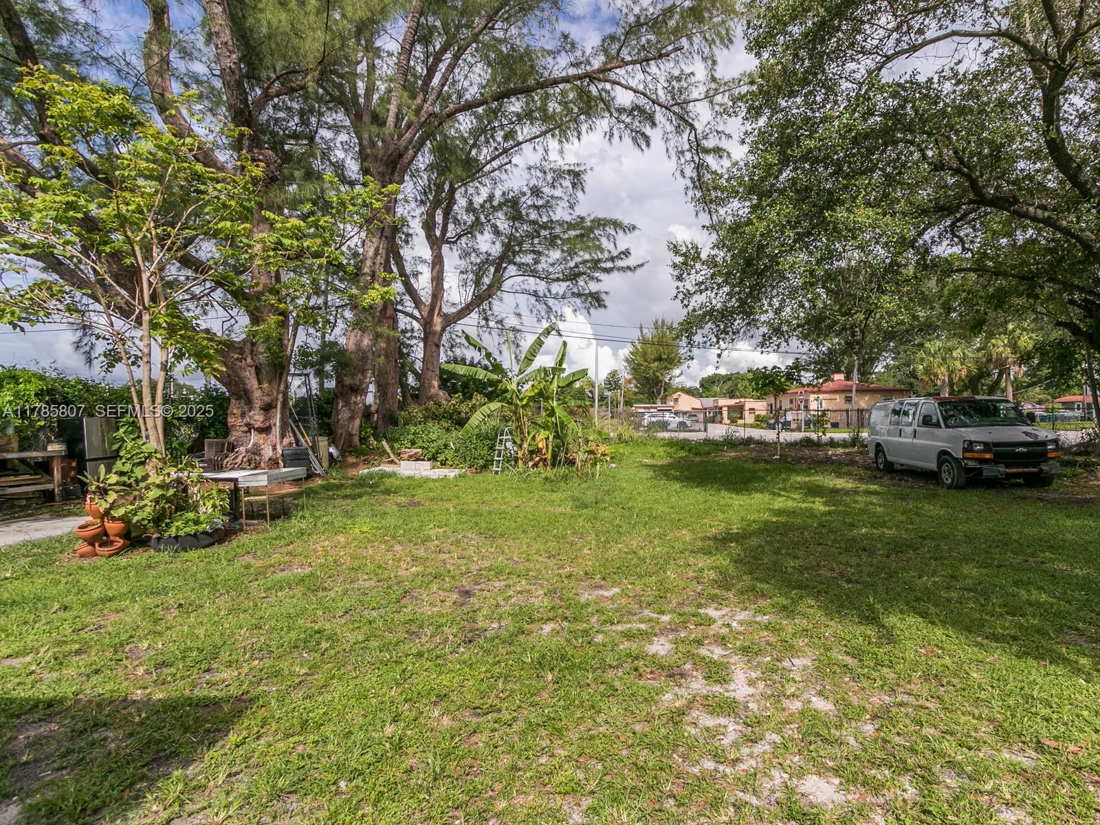 7946 Northwest 12th Place Miami, FL 33147 - Photo 2 of 3 a view of a park with large trees