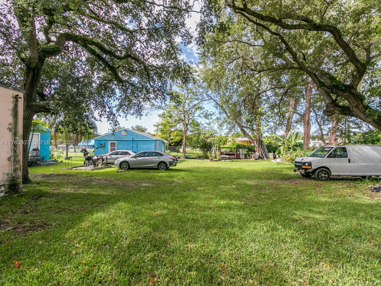 7946 Northwest 12th Place Miami, FL 33147 - Photo 3 of 3 a view of a park with large trees