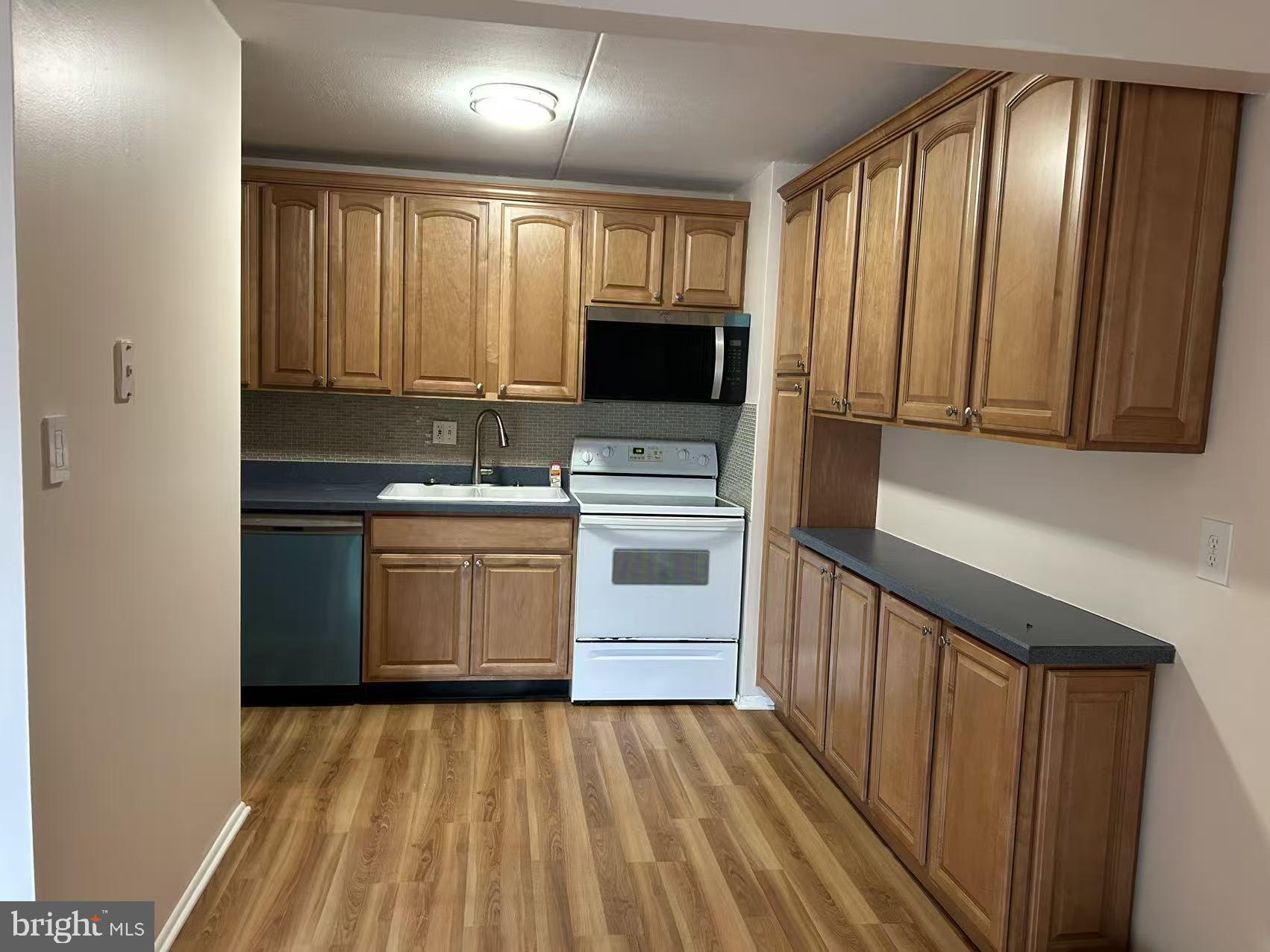 84 Welsh Tract Road Newark, DE 19713 - Photo 6 of 8 Modern kitchen with warm wood tones.