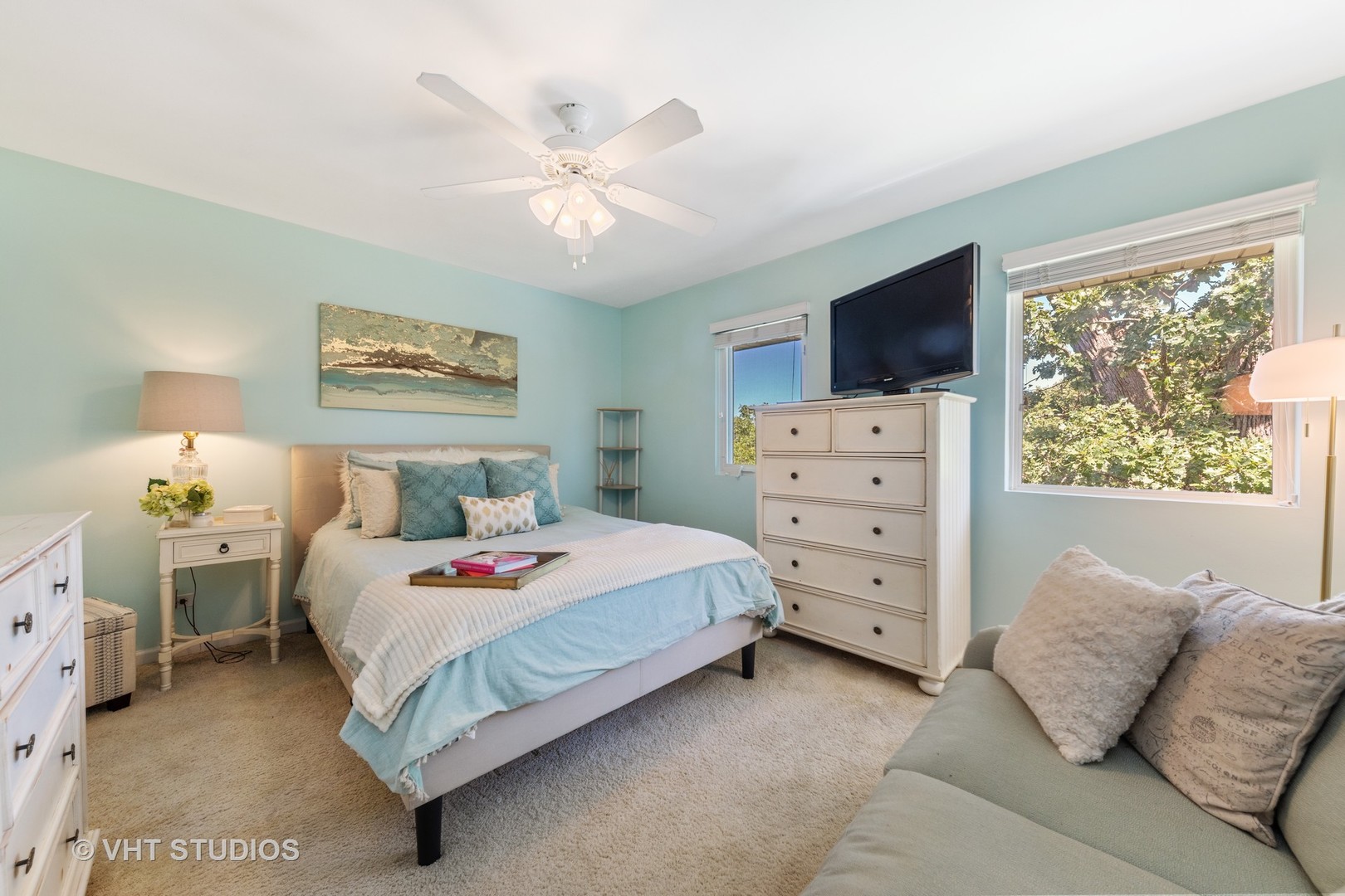 471 River Bend Road, Unit 103 Naperville, IL 60540 - Photo 14 of 29 a bedroom with a bed and a flat screen tv