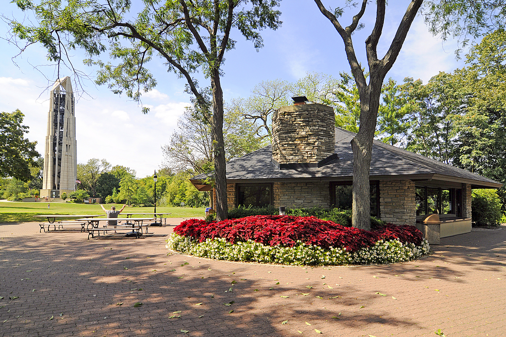 471 River Bend Road, Unit 103 Naperville, IL 60540 - Photo 27 of 29 a front view of a house with a garden and trees