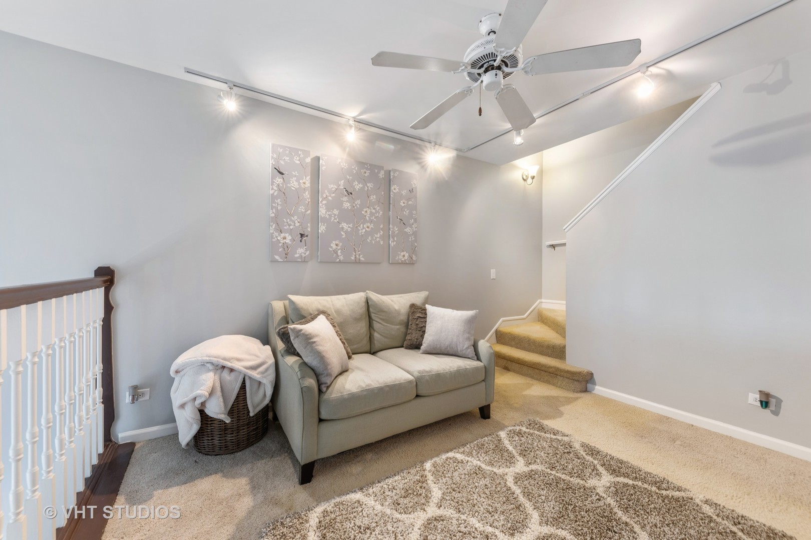 471 River Bend Road, Unit 103 Naperville, IL 60540 - Photo 10 of 29 a living room with furniture and a rug