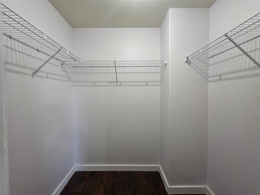 149 Ryan Street Anna, TX 75409 - Photo 30 of 38 a view of small space with racks on the wall
