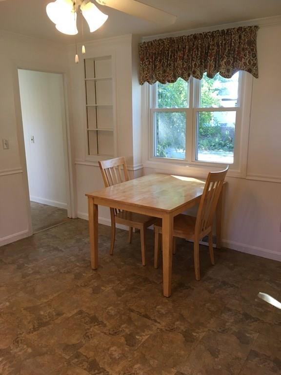 21 Whitman Street Leominster, MA 01453 - Photo 15 of 35 a dining room with a table and chairs