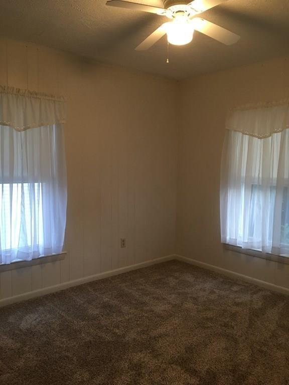 21 Whitman Street Leominster, MA 01453 - Photo 24 of 35 an empty room with a window