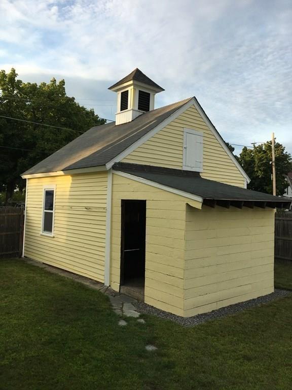 21 Whitman Street Leominster, MA 01453 - Photo 10 of 35 a front view of a house with a yard