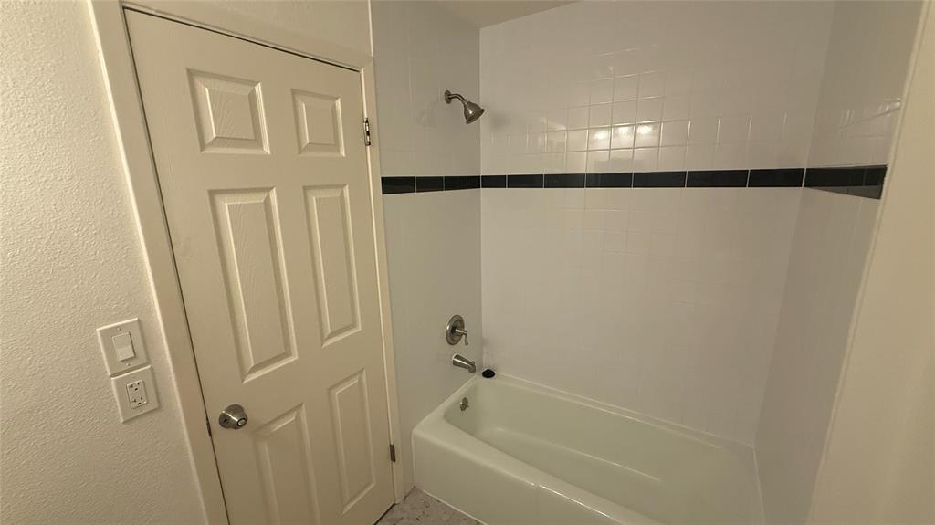 500 East Riverside Drive, Unit 132 Austin, TX 78704 - Photo 13 of 31 a view of bathroom with bathtub and shower