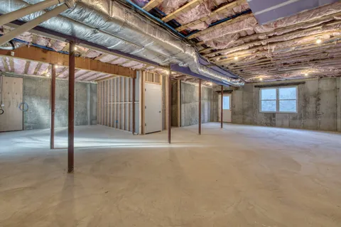 a view of a room with wooden walls