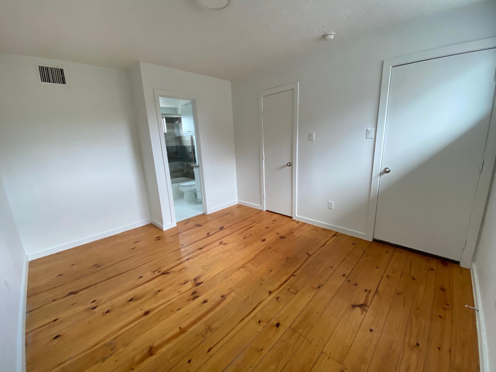 1708 Winter Street, Unit C Houston, TX 77007 - Photo 33 of 36 a view of empty room with wooden floor