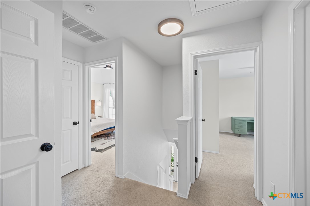 1710 Greening Way Leander, TX 78641 - Photo 28 of 47 wooden floor with white walls