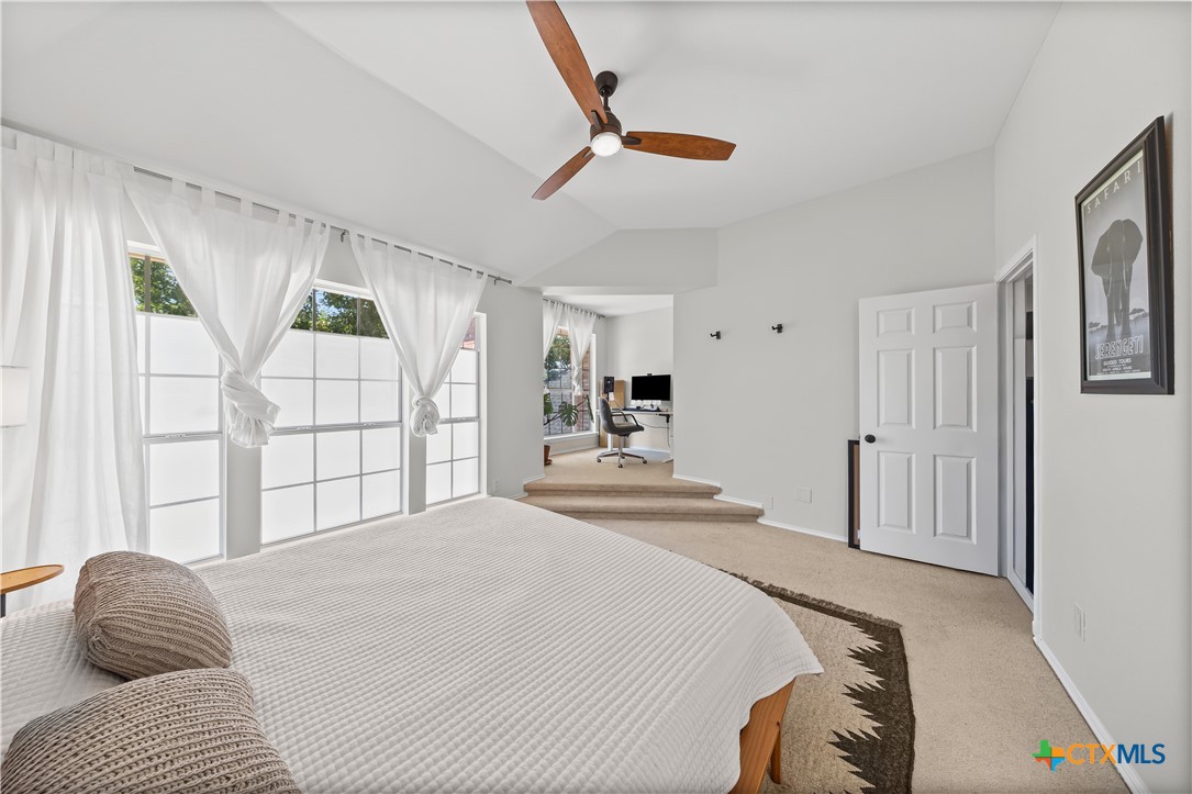 1710 Greening Way Leander, TX 78641 - Photo 33 of 47 a bedroom with a bed and a window