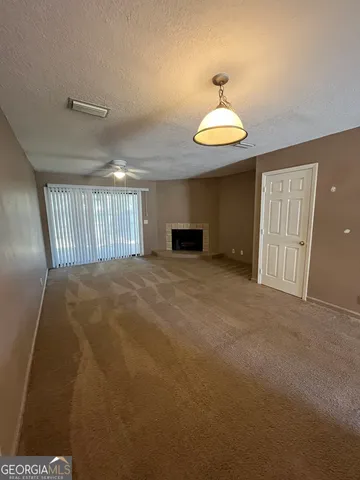 a big room with windows and bathroom