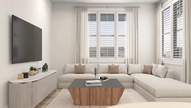 a bedroom with a bed and a large mirror