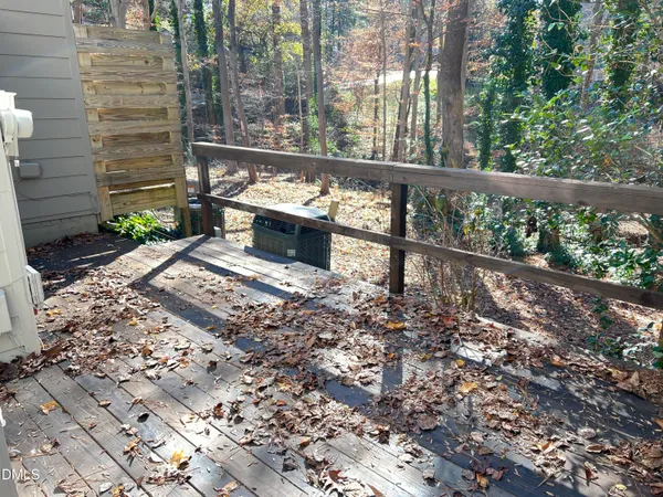 a view of a back yard from a balcony