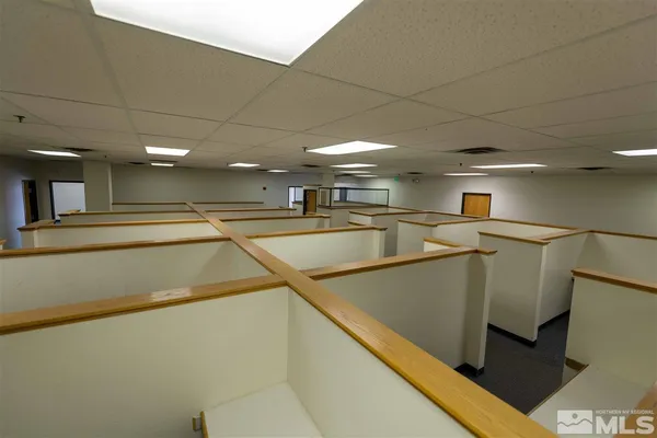 a view of a kitchen with a sink