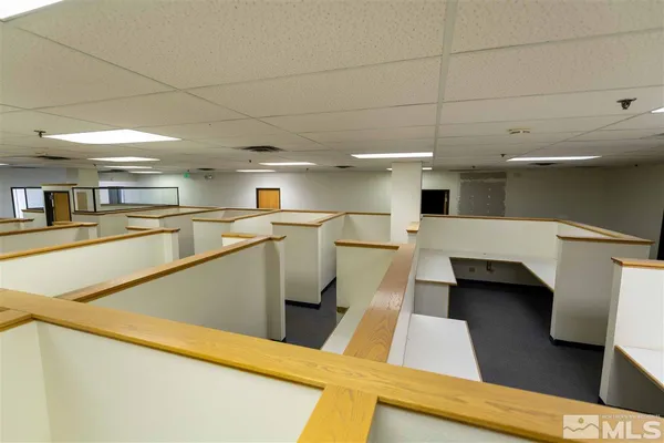 a view of a kitchen with furniture and a kitchen