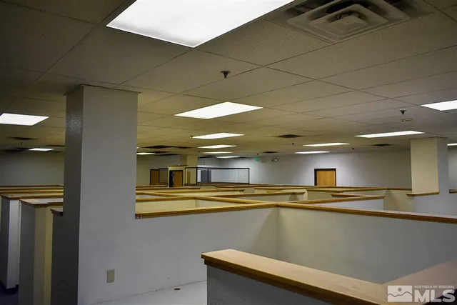 a view of a kitchen with a dishwasher and cabinets