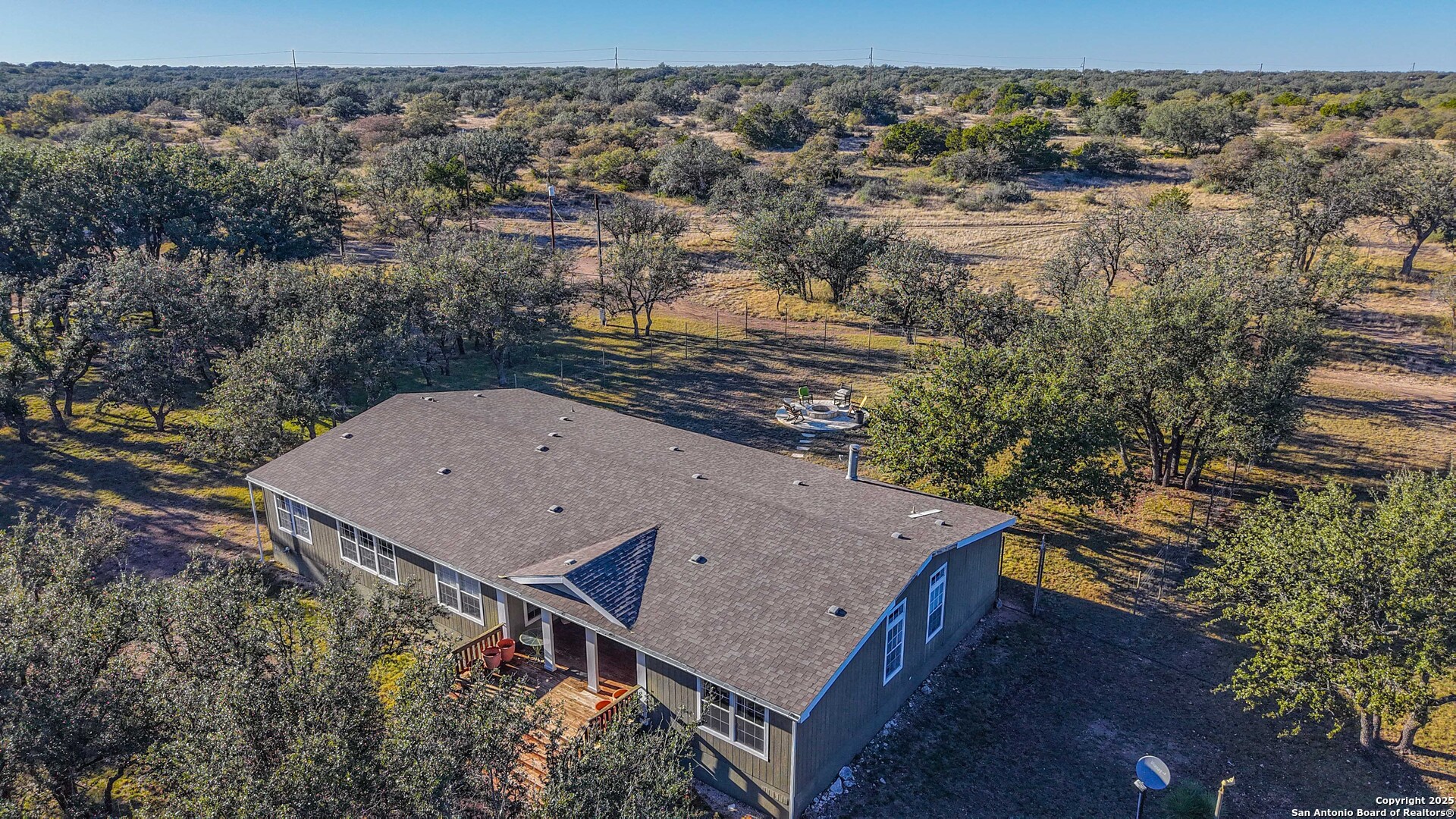 1950 Tolles Road Menard, TX 76859 - Photo 23 of 54 an aerial view of a house with a yard