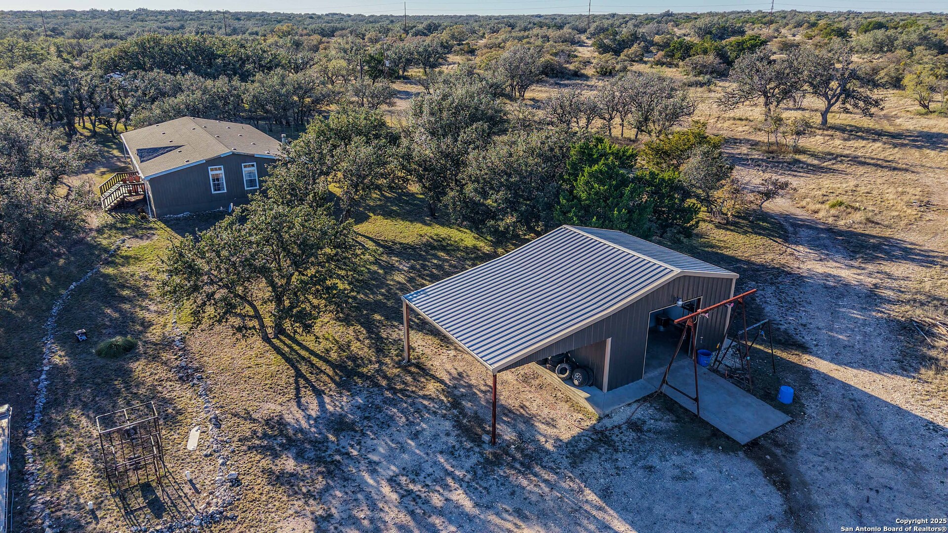 1950 Tolles Road Menard, TX 76859 - Photo 29 of 54 an aerial view of a house with a yard