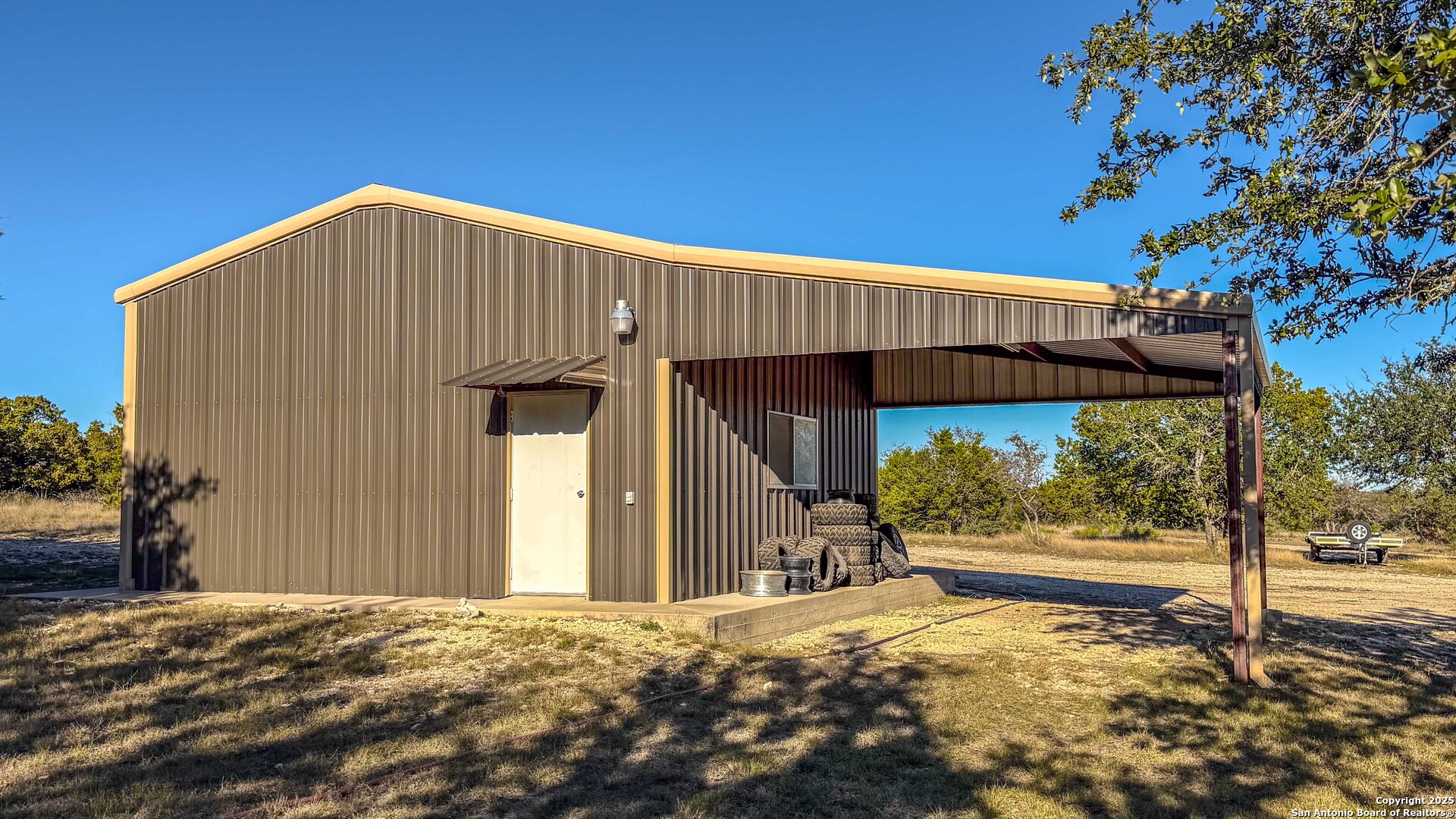 1950 Tolles Road Menard, TX 76859 - Photo 31 of 54 a view of a house with a tree in the background