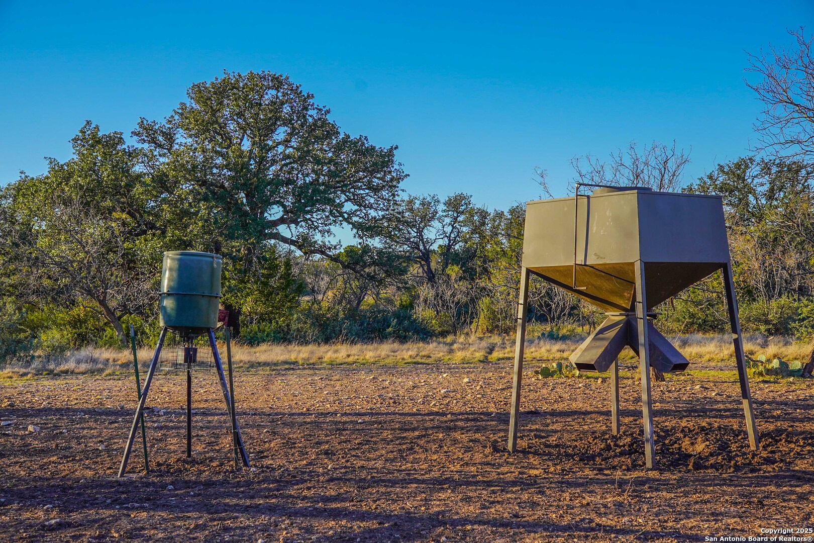 1950 Tolles Road Menard, TX 76859 - Photo 41 of 54 a table and chairs in front of a yard