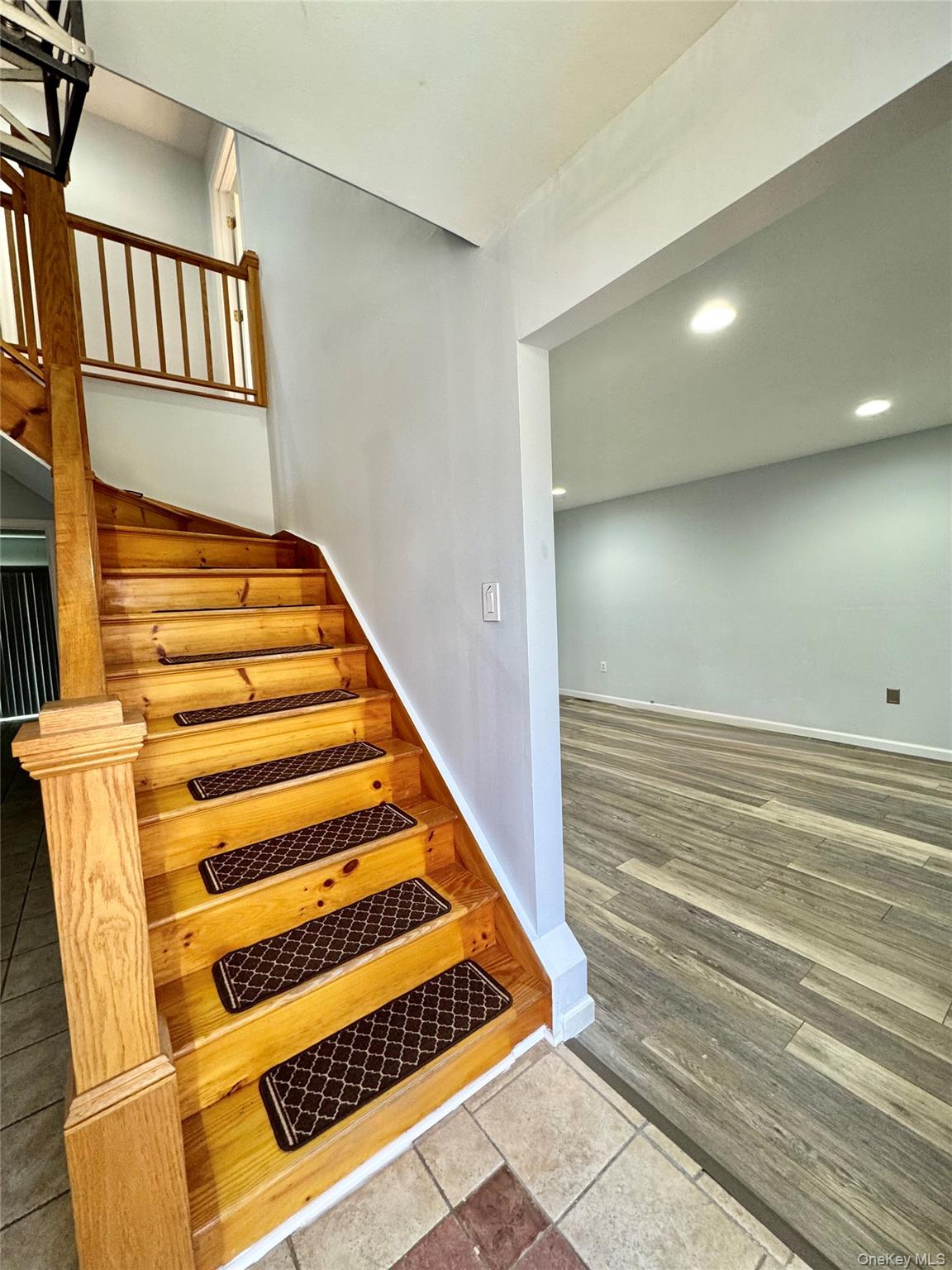 31 Denman Road Middletown, NY 10940 - Photo 3 of 18 Entryway featuring a wooden staircase, tile flooring, and light-colored walls