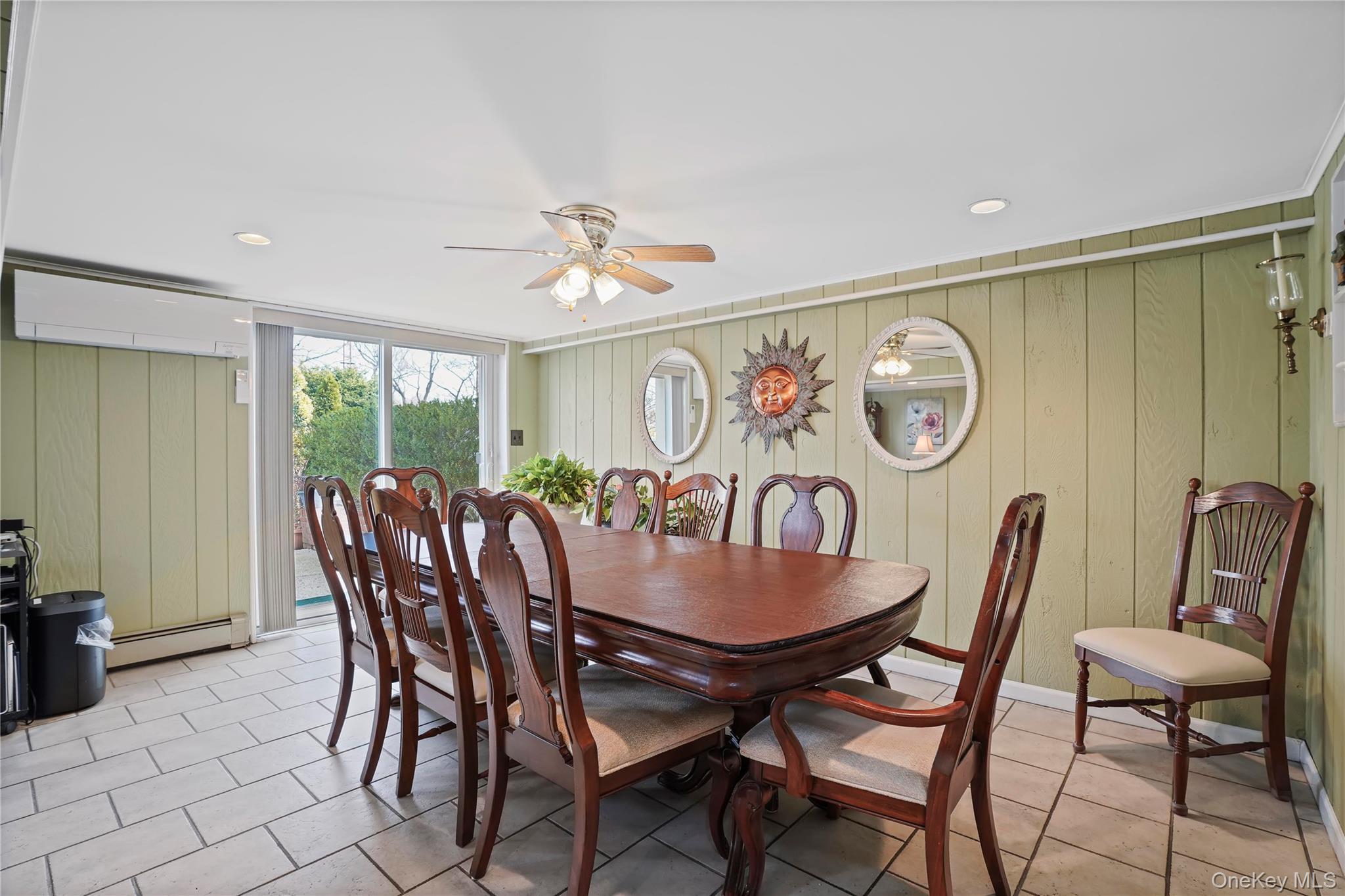 60-35 75th Street Queens, NY 11379 - Photo 4 of 29 a dining room with furniture and window