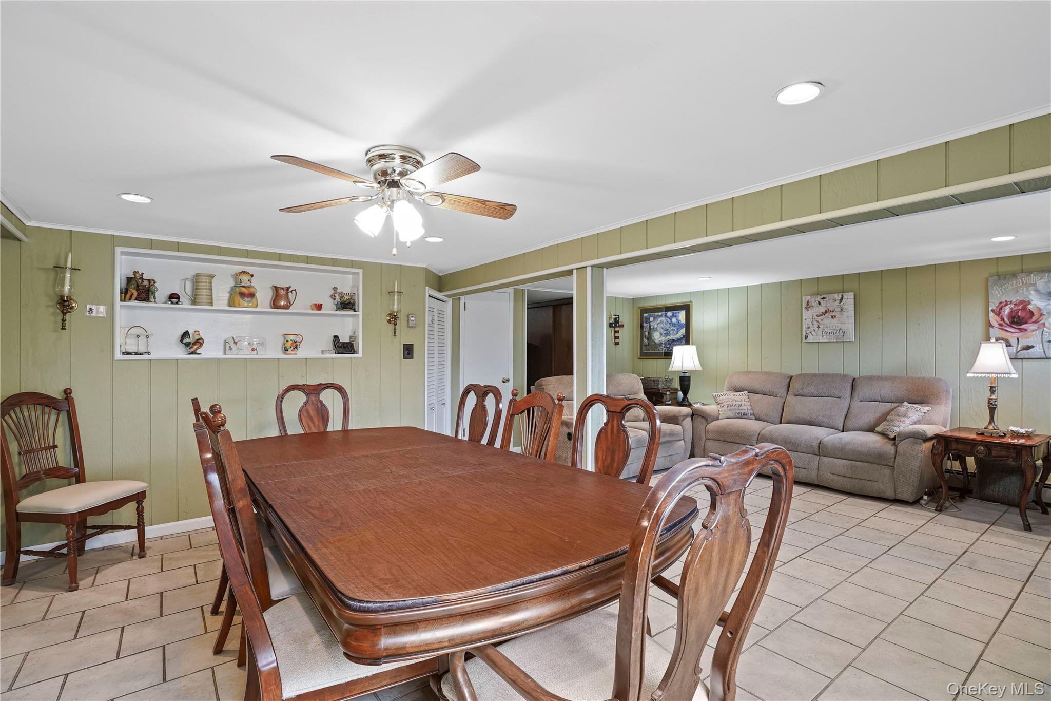 60-35 75th Street Queens, NY 11379 - Photo 5 of 29 a view of a dining room with furniture