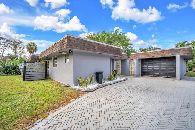a front view of house with yard