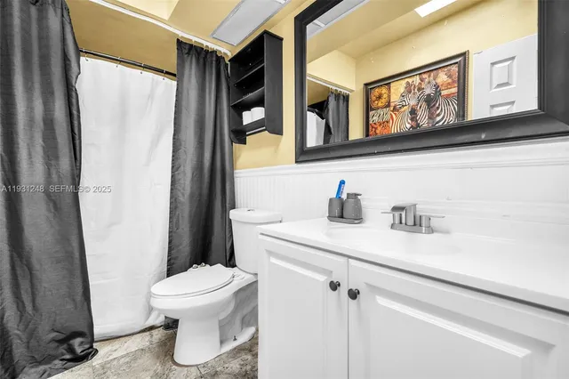 a bathroom with a sink and a toilet