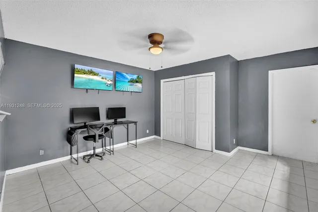 a view of kitchen with furniture and natural light